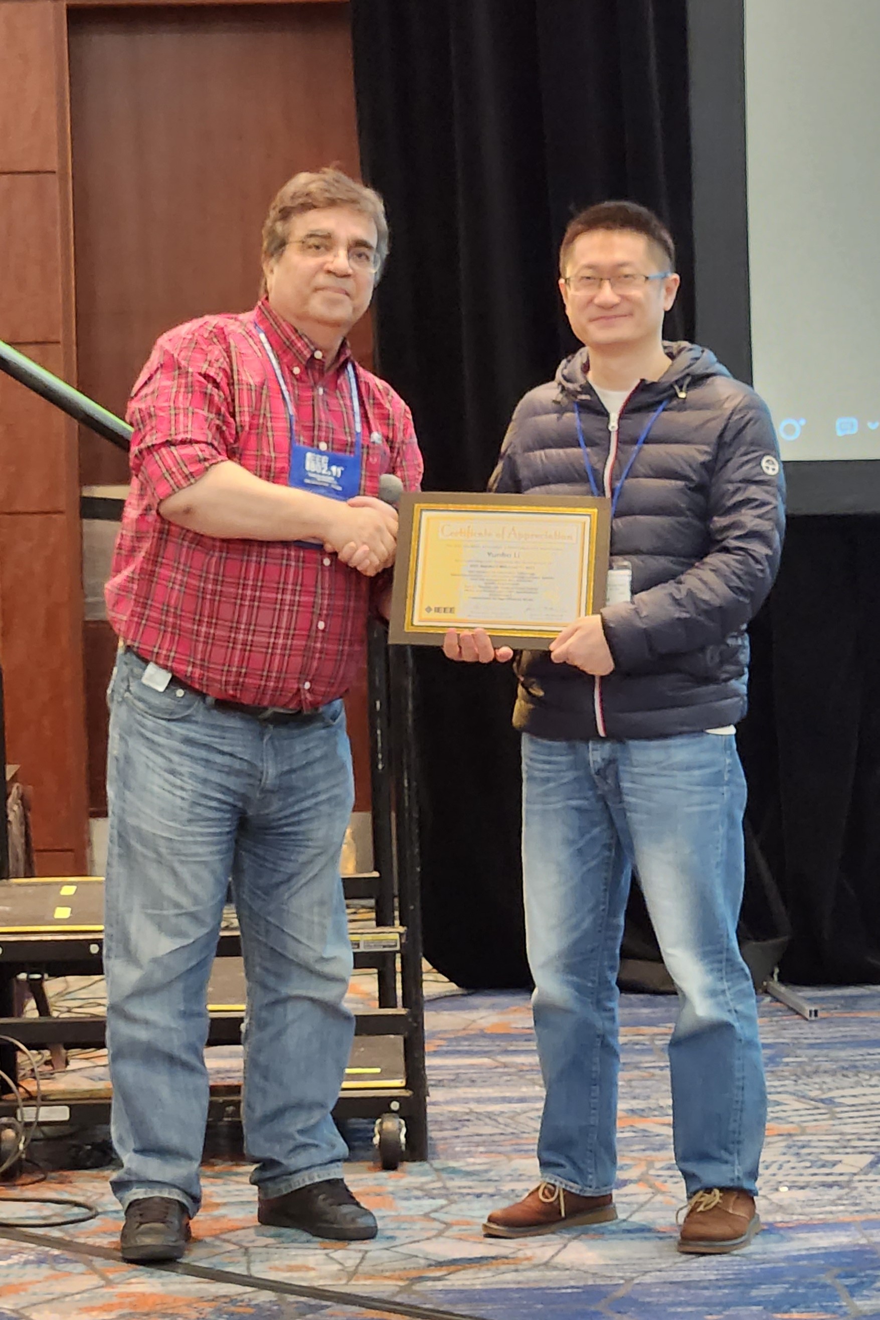 David Xun Yang accepting on behalf of Yunbo Li